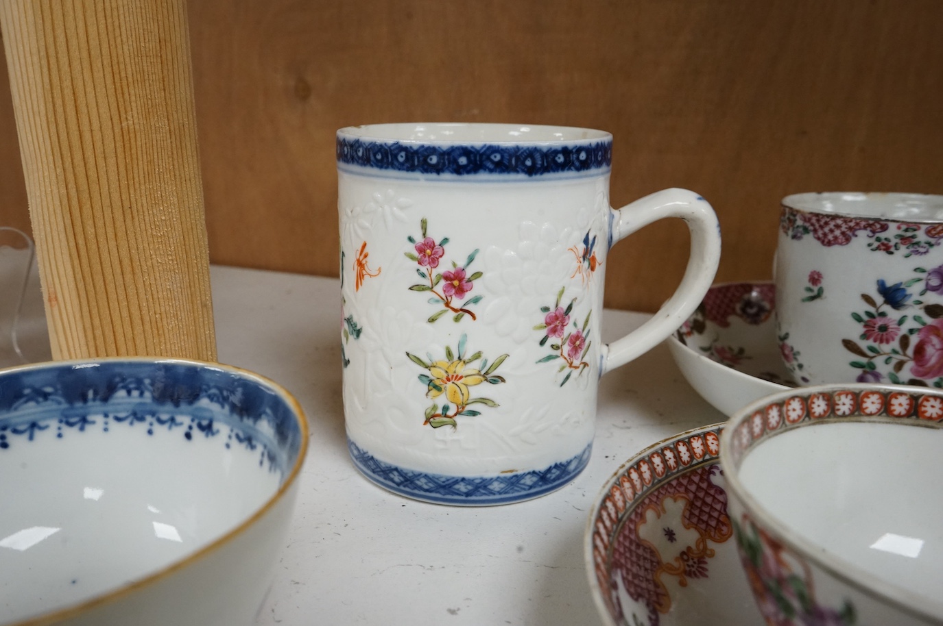 A group of 18th century Chinese export tea and coffee cups, saucers and a mug, mug 9cm high